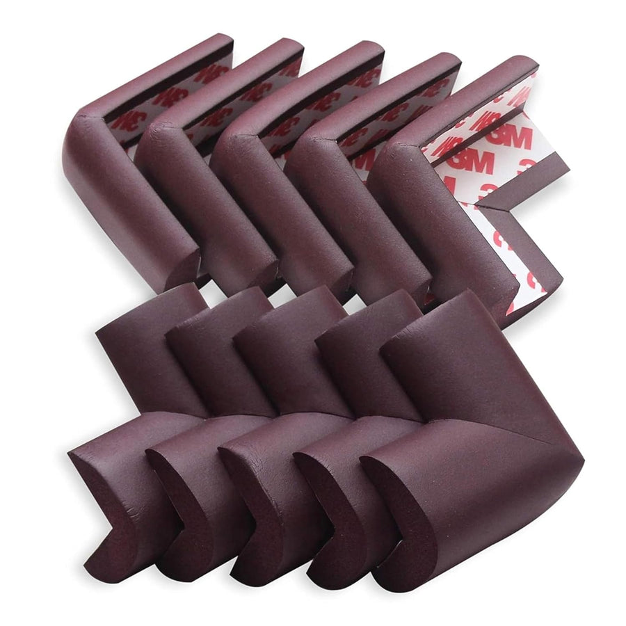 Set of L-shaped brown corner guards designed for baby proofing, featuring a soft foam material and adhesive backing for easy installation.