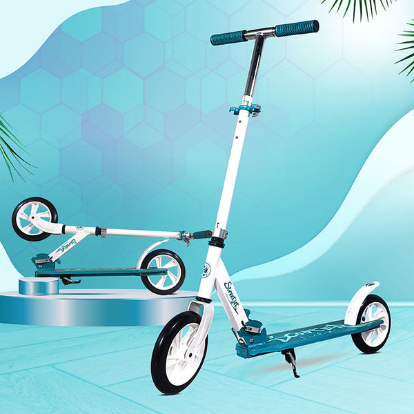 A vibrant white and teal kick scooter designed for kids aged 6 and up, featuring a sturdy frame, comfortable grips, and smooth wheels, set against a colorful geometric background.