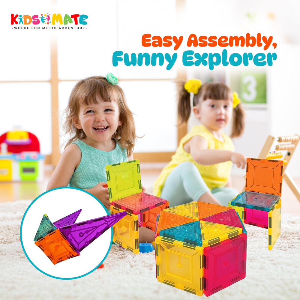 Two smiling children play with colorful magnetic tiles, building structures. The tiles are in vibrant shades of red, yellow, green, and blue, showcasing creativity and fun.