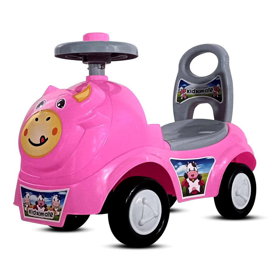 A vibrant pink ride-on toy designed for kids, featuring a smiling pig face on the front and a comfortable gray seat. The toy has sturdy wheels and a steering wheel for fun rides.