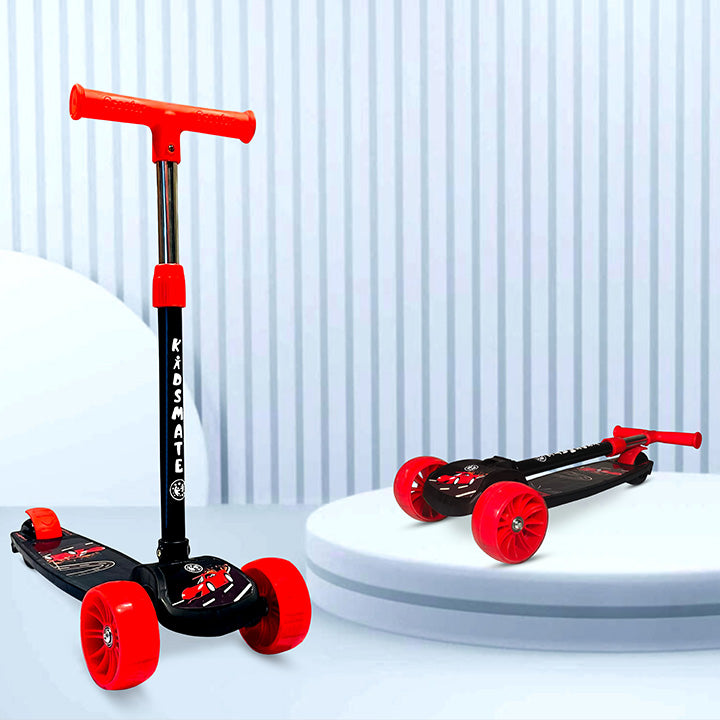 A vibrant red and black kick scooter designed for kids, featuring a sturdy frame, wide wheels, and a comfortable handlebar. The brand 'KIDSMATE' is visible on the scooter.