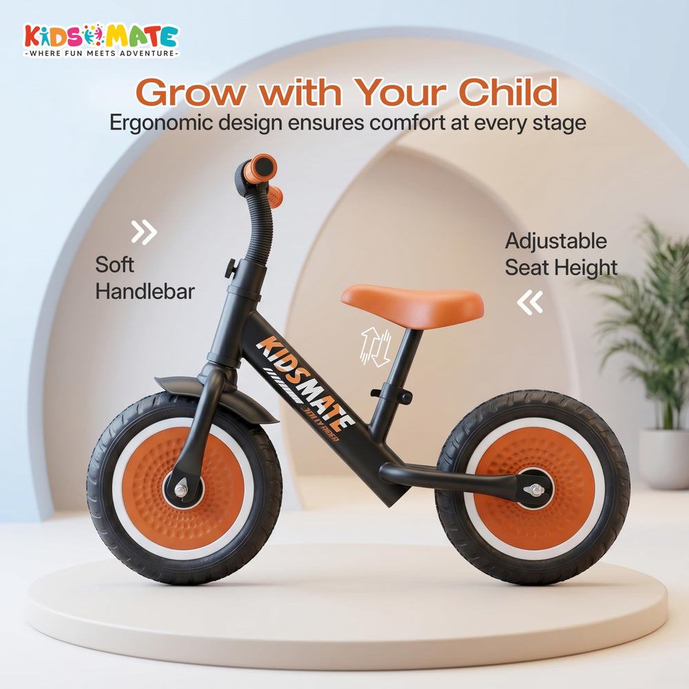 A stylish balance bike designed for kids, featuring a sleek black frame with orange accents. The bike has an adjustable seat height and a comfortable handlebar, set against a light, modern background.