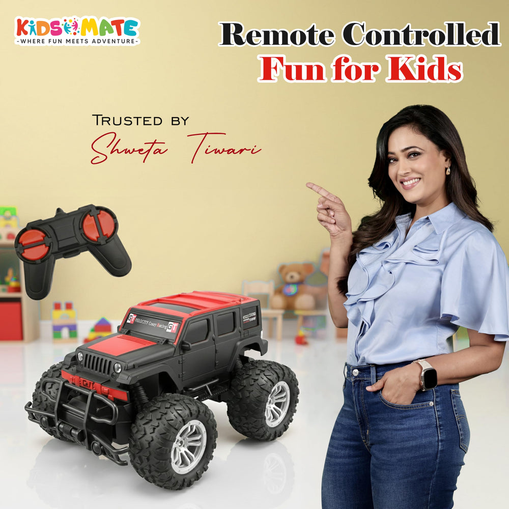 A vibrant red and black jumbo SUV remote control car with large wheels, accompanied by a remote control. A smiling woman holds the remote, showcasing a fun atmosphere. The Kidsmate logo is visible.