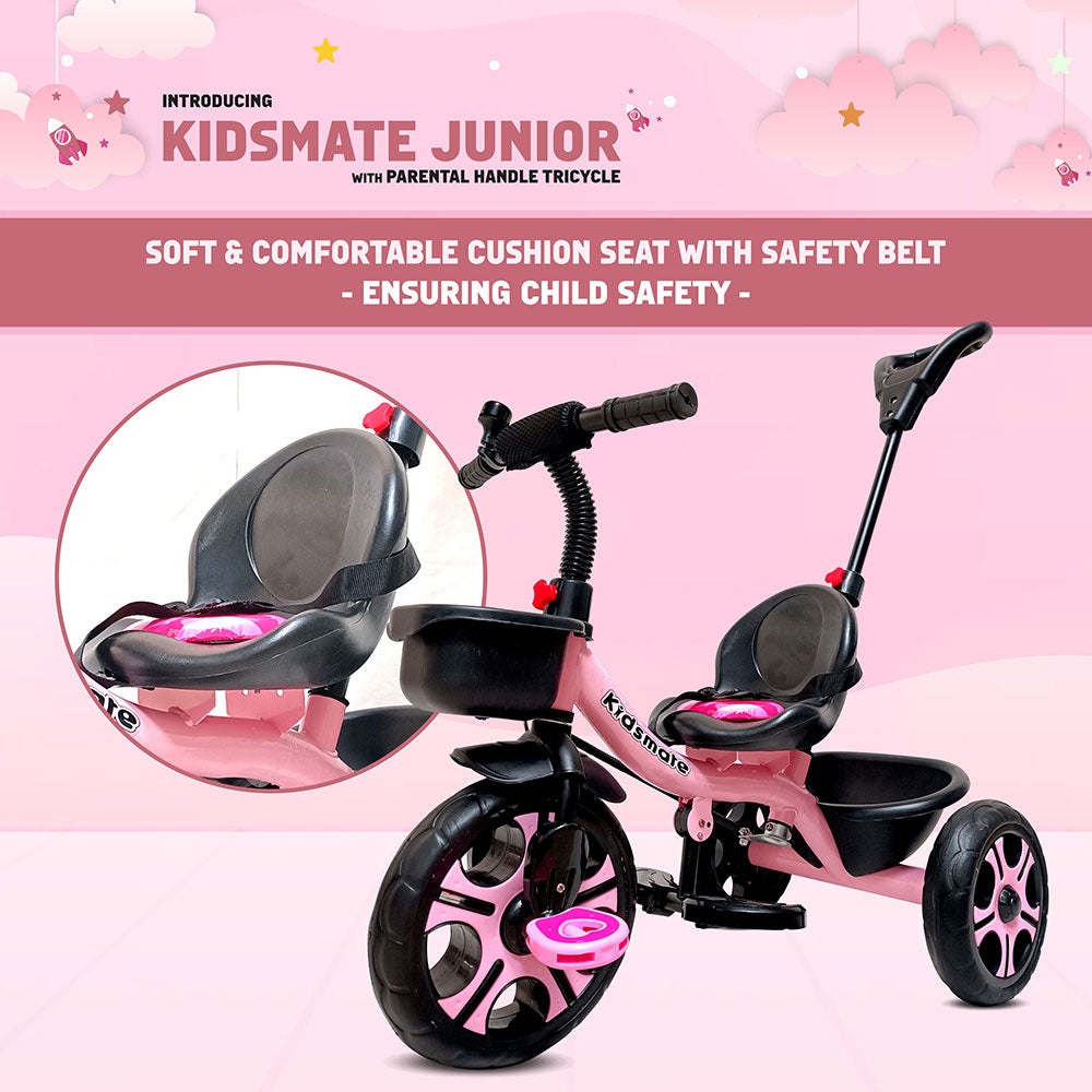 A vibrant pink Kidsmate Junior tricycle featuring a soft, comfortable cushion seat with a safety belt. The tricycle has a parental control handle for easy steering, perfect for young children.