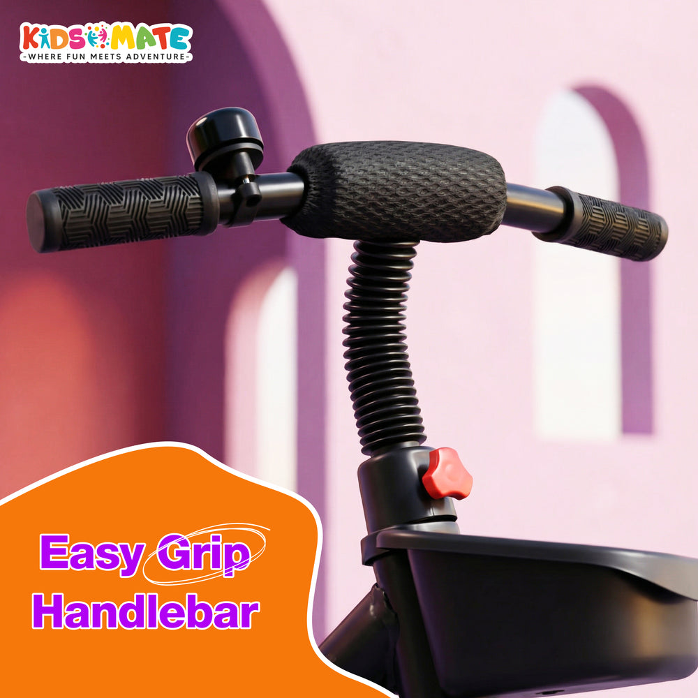 A close-up view of a tricycle's easy grip handlebar, featuring a textured grip and a red control button. The background is softly blurred, highlighting the handlebar's design.