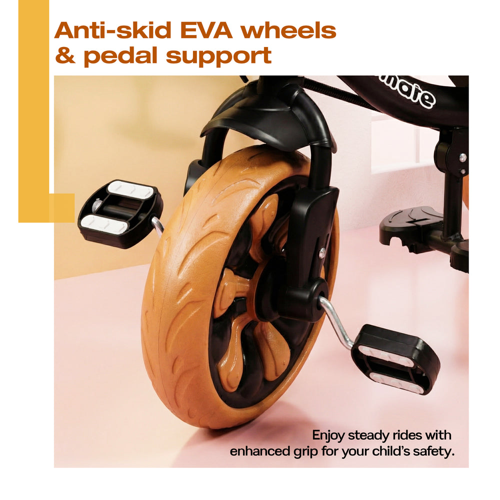 Close-up of a Kidsmate Junior Tricycle's anti-skid EVA wheels and pedal support, showcasing the sturdy design for enhanced grip and safety during rides.