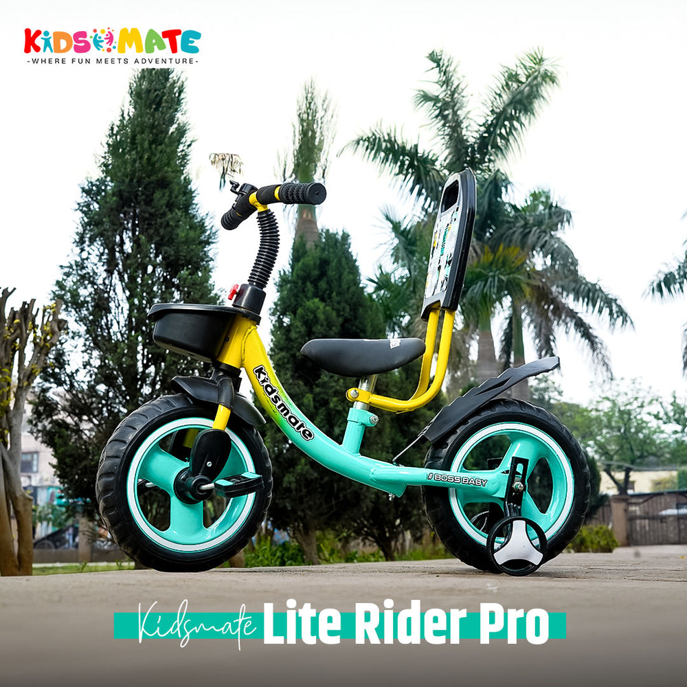 A vibrant Kidsmate Lite Rider Pro balance cycle for kids, featuring a bright turquoise frame, yellow accents, and sturdy black wheels, set against a backdrop of lush greenery.