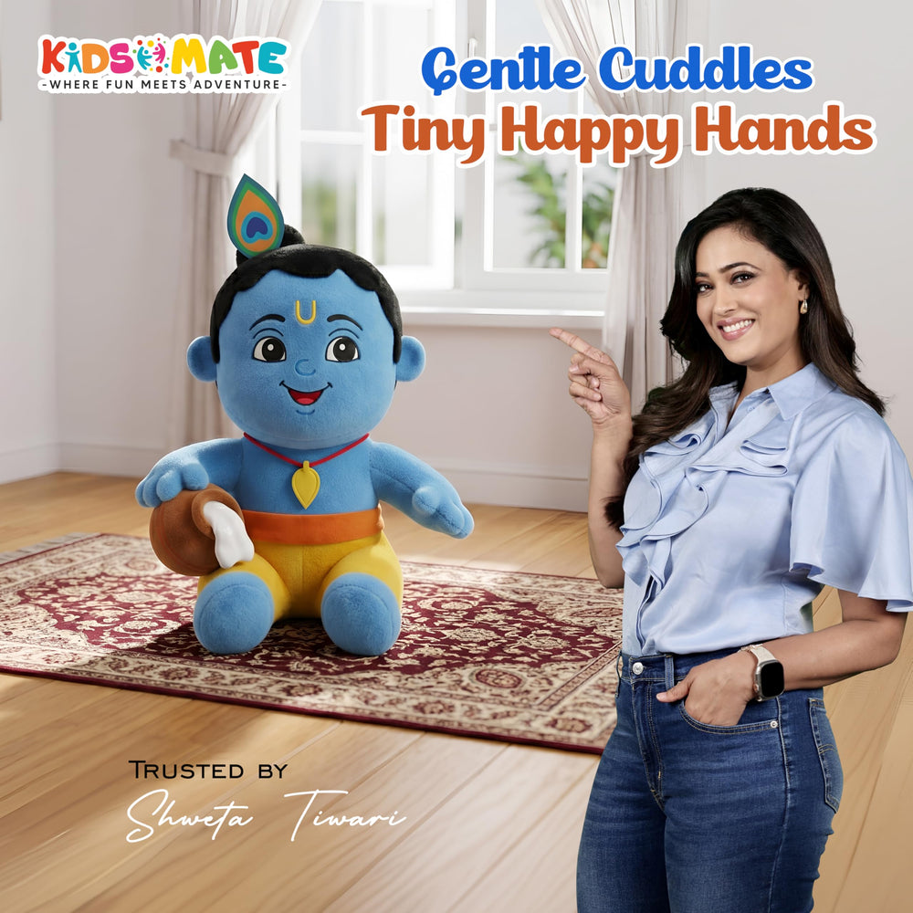 A cheerful Little Krishna musical soft toy with blue skin and a playful expression sits on a colorful rug. A woman in a light blue blouse smiles beside it, creating a warm, inviting atmosphere.