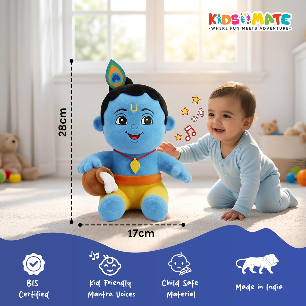 A cheerful little boy sits beside a soft, plush Krishna toy with a blue face and colorful attire. The toy features a musical element and is surrounded by a cozy indoor setting.