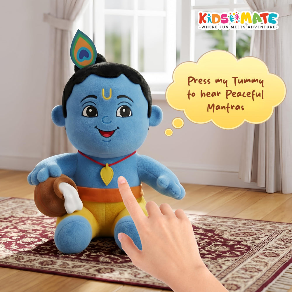 A soft toy of Little Krishna with a cheerful expression, wearing traditional attire and holding a flute. A hand is reaching towards the toy, with a speech bubble saying 'Press my Tummy to hear Peaceful Mantras'.