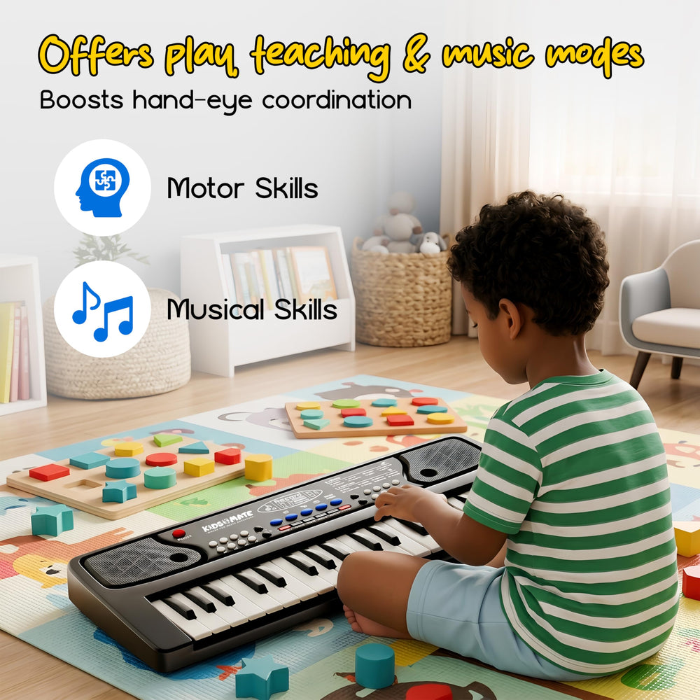A child playing with a colorful piano keyboard on a play mat, surrounded by building blocks. The keyboard features various buttons and keys, promoting music and motor skills.