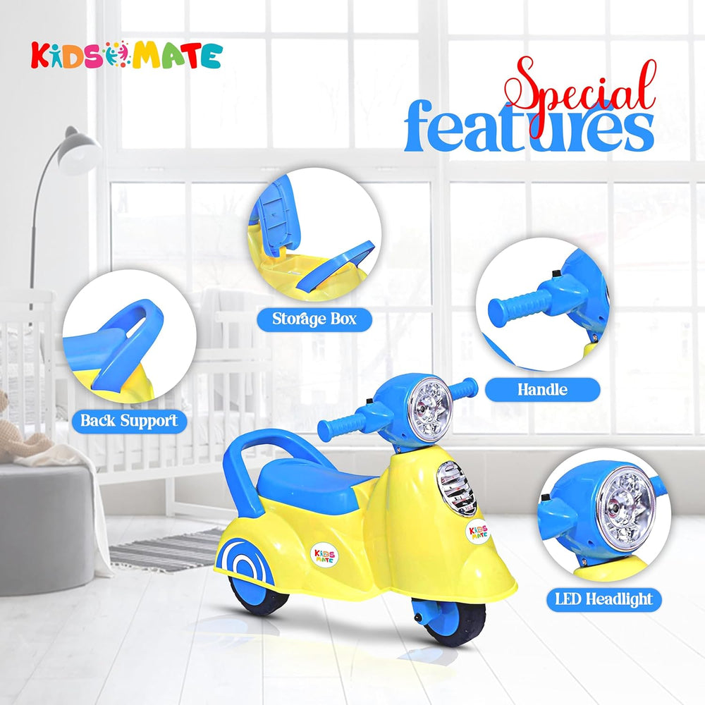 Bright yellow and blue Kidsmate Rhino Push Scooter featuring a storage box, back support, handle, and LED headlight, set against a cozy indoor background with large windows.