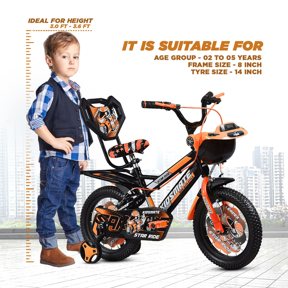 A vibrant kids bicycle in orange and black, featuring training wheels and playful graphics. A young boy in a stylish outfit poses next to the bike, showcasing its fun design.