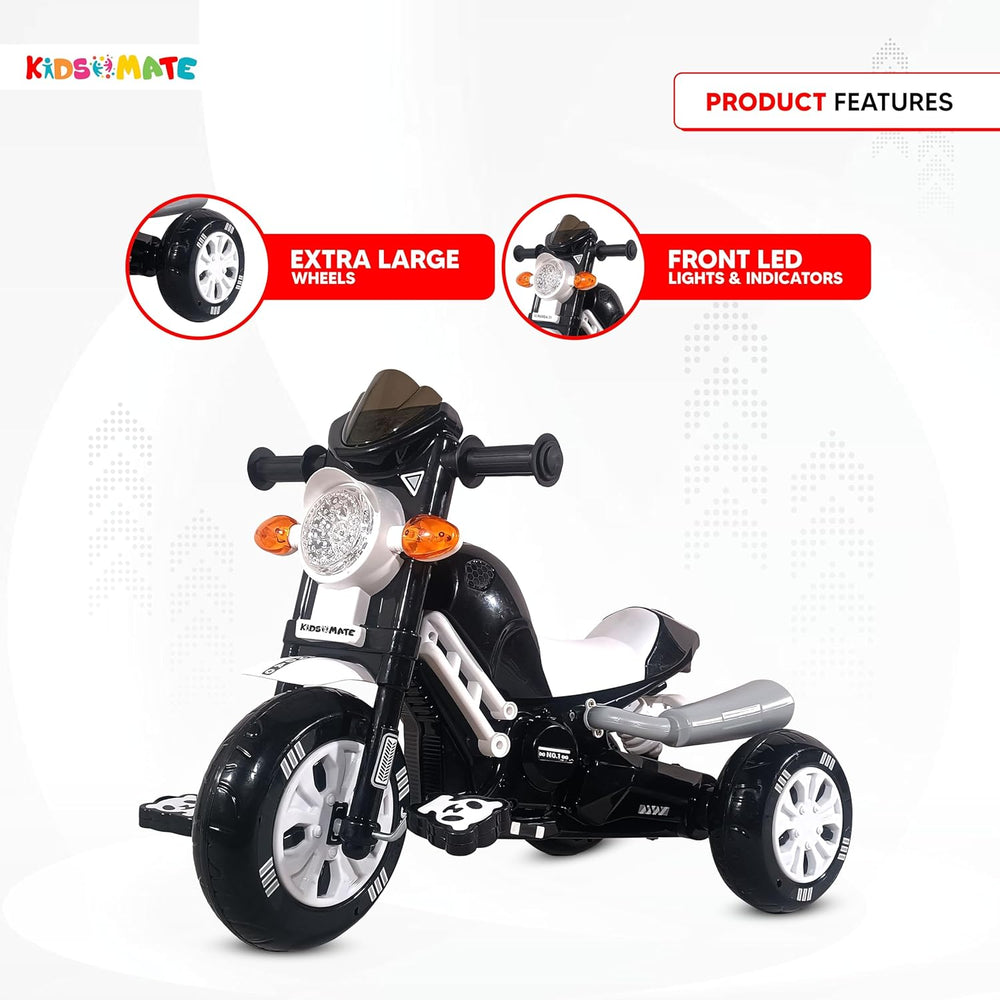 A sleek black and white tricycle designed for kids, featuring extra large wheels, a musical horn, and front LED lights. The Kidsmate logo is visible on the frame.