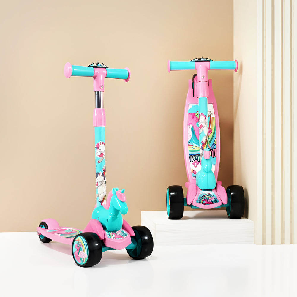 A vibrant pink kick scooter designed for kids, featuring a unicorn theme and LED wheels. The scooter stands against a soft beige background, showcasing its playful design and sturdy build.