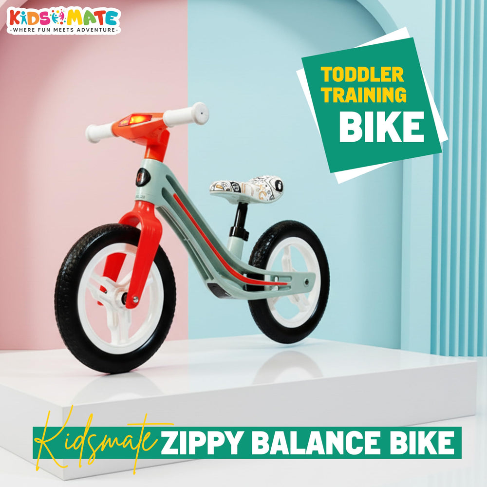 A vibrant Kidsmate Zippy Balance Bike for kids, featuring a red and white frame, black wheels, and a comfortable seat. The bike is displayed against a colorful backdrop, emphasizing its playful design.